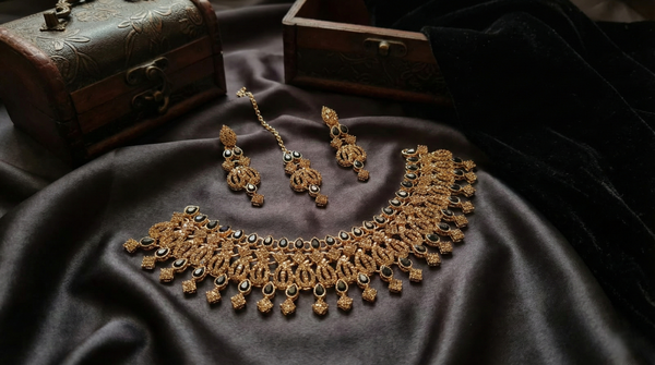 Black Stone Royal Gold-Plated Bridal Jewelry Set with Statement Necklace & Tikka